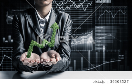 Businessman presenting growing graph. Businessman presenting growing graph. 36308527