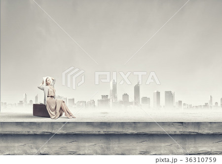 Woman with suitcase 36310759