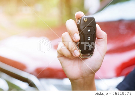 lady female holding car keys with car lady female holding car keys with car 36319375