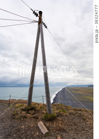 electric wire post on Dyrholaey cape in Iceland electric wire post on Dyrholaey cape in Iceland 36324777