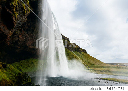 cave and Seljalandsfoss waterfall in Iceland 36324781