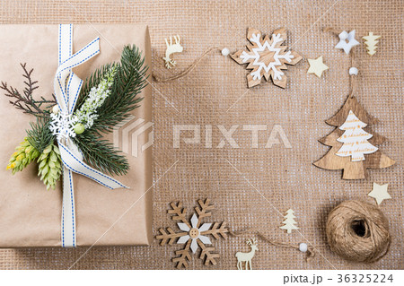 Classy Christmas gifts box presents in brown paper Classy Christmas gifts box presents in brown paper 36325224