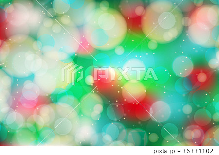 Festive colorful bokeh glitter light blur on green 36331102