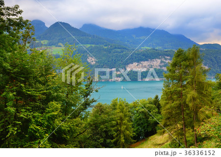 View into beautiful mountain lake on a cloudy day 36336152