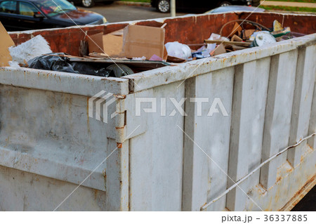 Dumpsters being full with garbage Dumpsters being full with garbage 36337885
