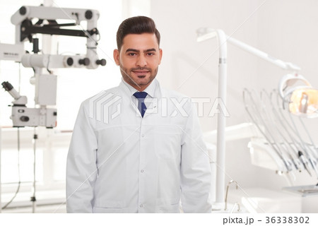 Professional dentist at his clinic Professional dentist at his clinic 36338302
