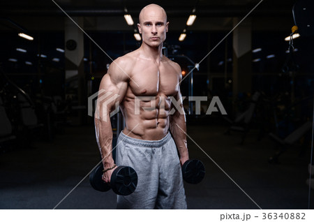 Brutal strong bodybuilder athletic men muscles 36340882
