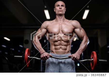Brutal strong bodybuilder athletic men muscles 36340887