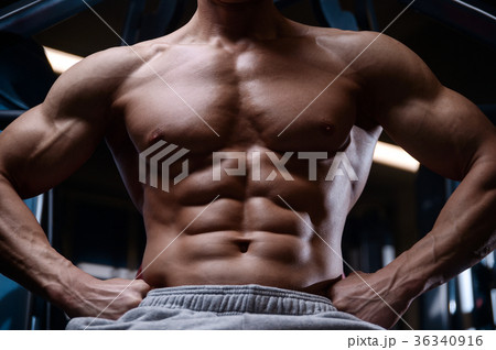 Brutal strong bodybuilder athletic men muscles 36340916