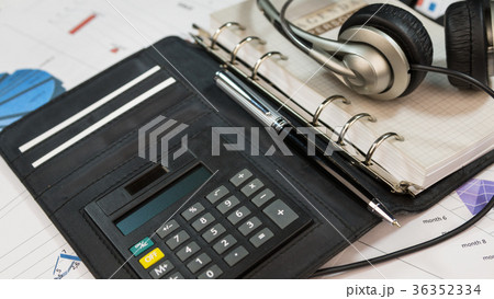 Calculator, the diary and the headset Calculator, the diary and the headset 36352334