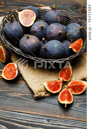 Fig isolated on wooden background Fig isolated on wooden background 36352884
