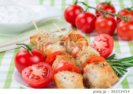 Chicken pieces grilled on skewers 36353454