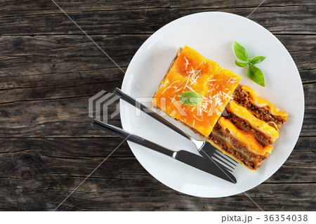 portion of italian lasagna on plate 36354038