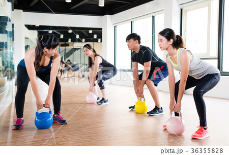 professional Asian fitness trainer teaching 36355828