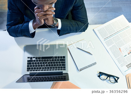 Skillful manager is working in office 36356296
