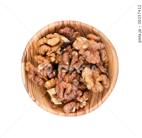 Shelled walnut in a wooden bowl Shelled walnut in a wooden bowl 36357412