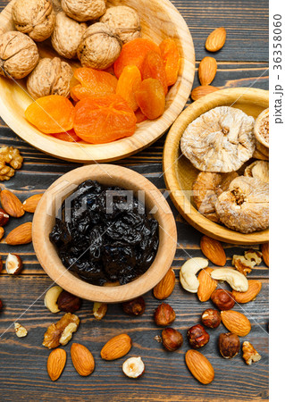 dried fruits figs, apricots, plums and nuts on 36358060