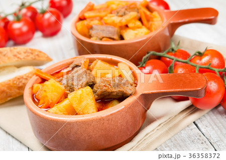 Stewed potatoes in ceramic bowl 36358372