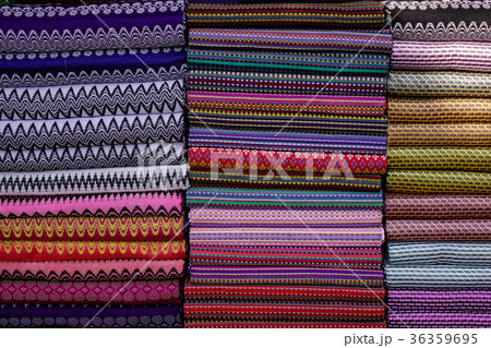 Colorful textile for sale at a traditional market 36359695