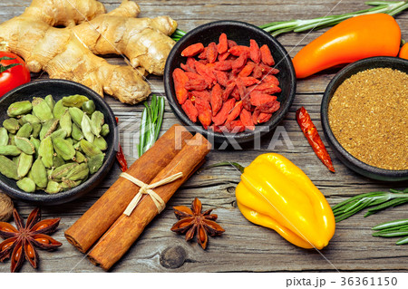 Spices and herbs on wooden background Spices and herbs on wooden background 36361150