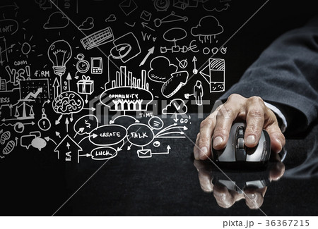 Businessman using mouse Businessman using mouse 36367215