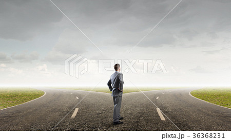 Businessman choosing his way Businessman choosing his way 36368231