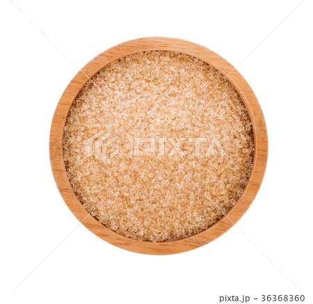Brown sugar in wooden bowl on white background Brown sugar in wooden bowl on white background 36368360