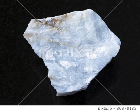 raw Angelite (Blue Anhydrite) stone on dark 36378135