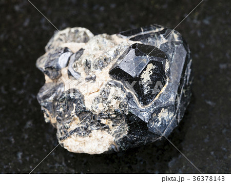 black Spinel crystal on black Diopside crystals 36378143