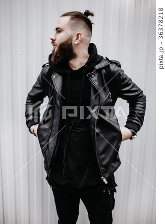 Modern young bearded man in black style clothes 36378218