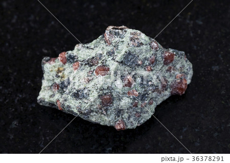 raw eclogite stone on dark g background raw eclogite stone on dark g background 36378291