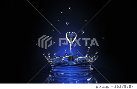Water drop in form of heart in blue spot light 36378587