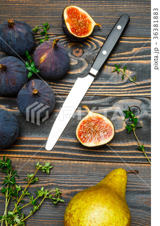 Figs on wooden background 36381883