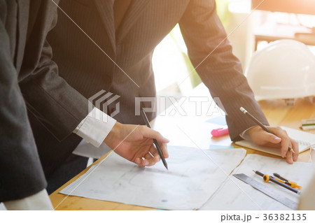 Two business Engineer discussing meeting. 36382135