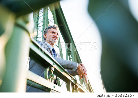 Mature businessman in a city. 36382257