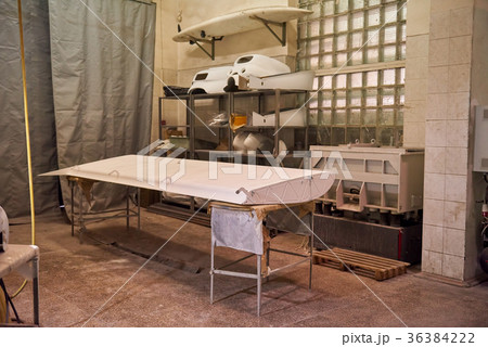 Aircraft detail on a table. Aircraft detail on a table. 36384222