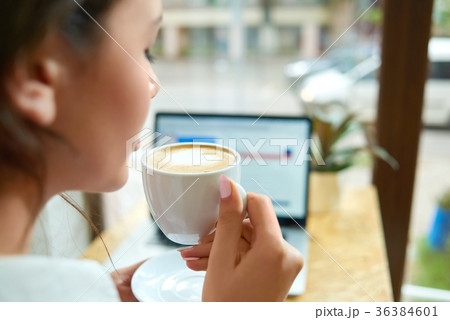 Young brunette at the cafe Young brunette at the cafe 36384601