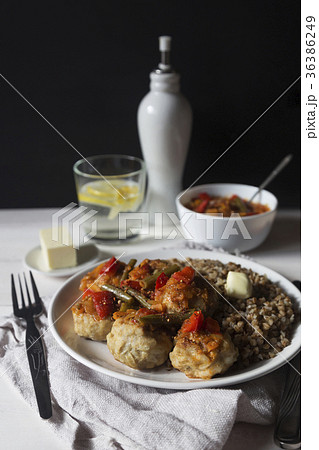 Meatballs with vegetable sauce and buckwheat 36386249