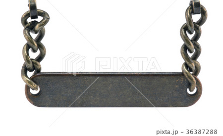 Old metal plate hanging on a chain  36387288