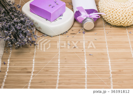 Bar of natural lavandah soap on white soap dish Bar of natural lavandah soap on white soap dish 36391812