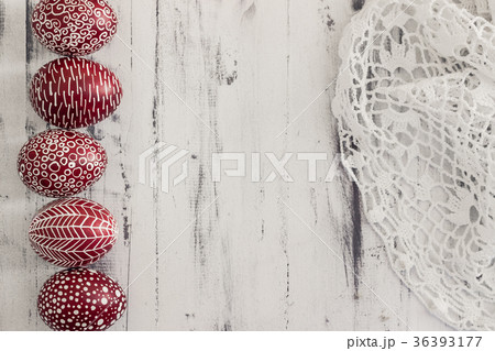 Decorated Easter eggs on wooden background Decorated Easter eggs on wooden background 36393177