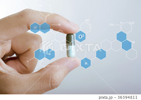 hand holding capsule medicine with icon chemical hand holding capsule medicine with icon chemical 36394811