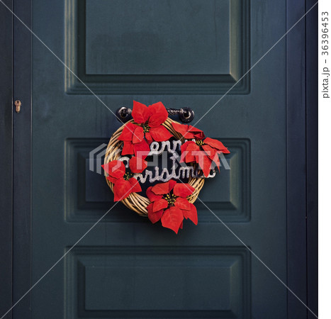 traditional red and green Christmas wreath on a traditional red and green Christmas wreath on a 36396453