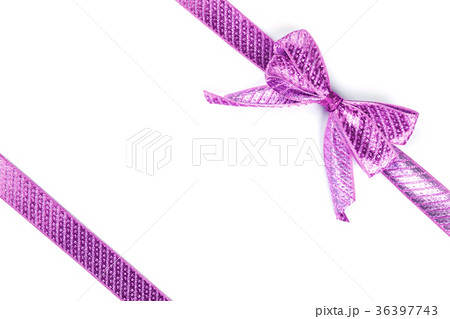 Purple bow tied using silk ribbon Purple bow tied using silk ribbon 36397743