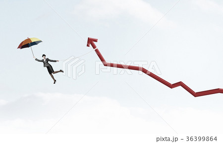 Woman flying on umbrella 36399864