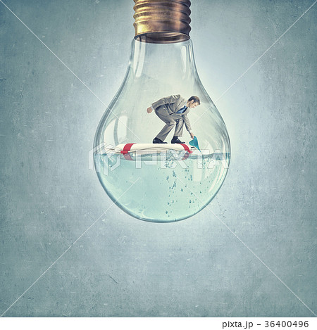 Man inside light bulb 36400496