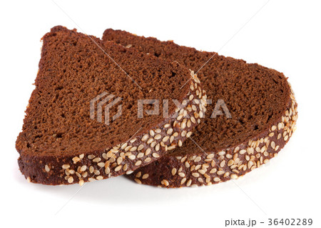 Two slices of black bread with sesame seeds 36402289