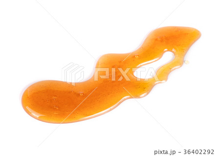 Honey stain isolated on a white background Honey stain isolated on a white background 36402292