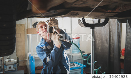 Man caucasian worker - mechanic with screwdriver Man caucasian worker - mechanic with screwdriver 36402928