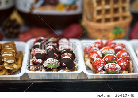 Belgian waffles in bakery - food background Belgian waffles in bakery - food background 36410749